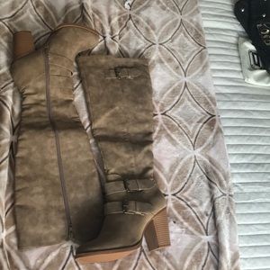 Never worn knee high boot